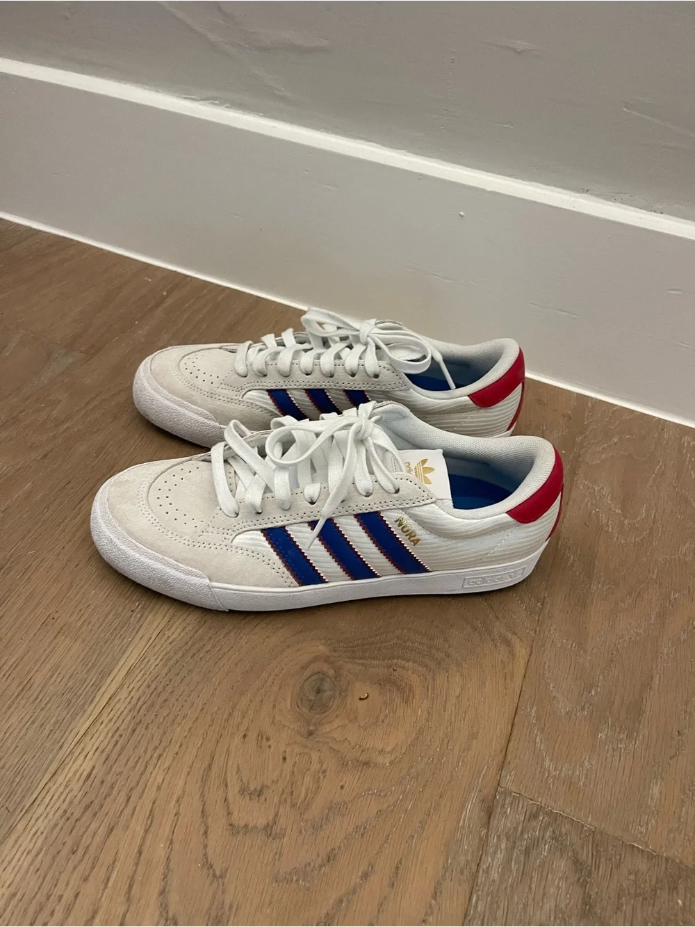 Adidas Woman’s Nora White Suede Sneakers with Blue Stripes & Red Heel